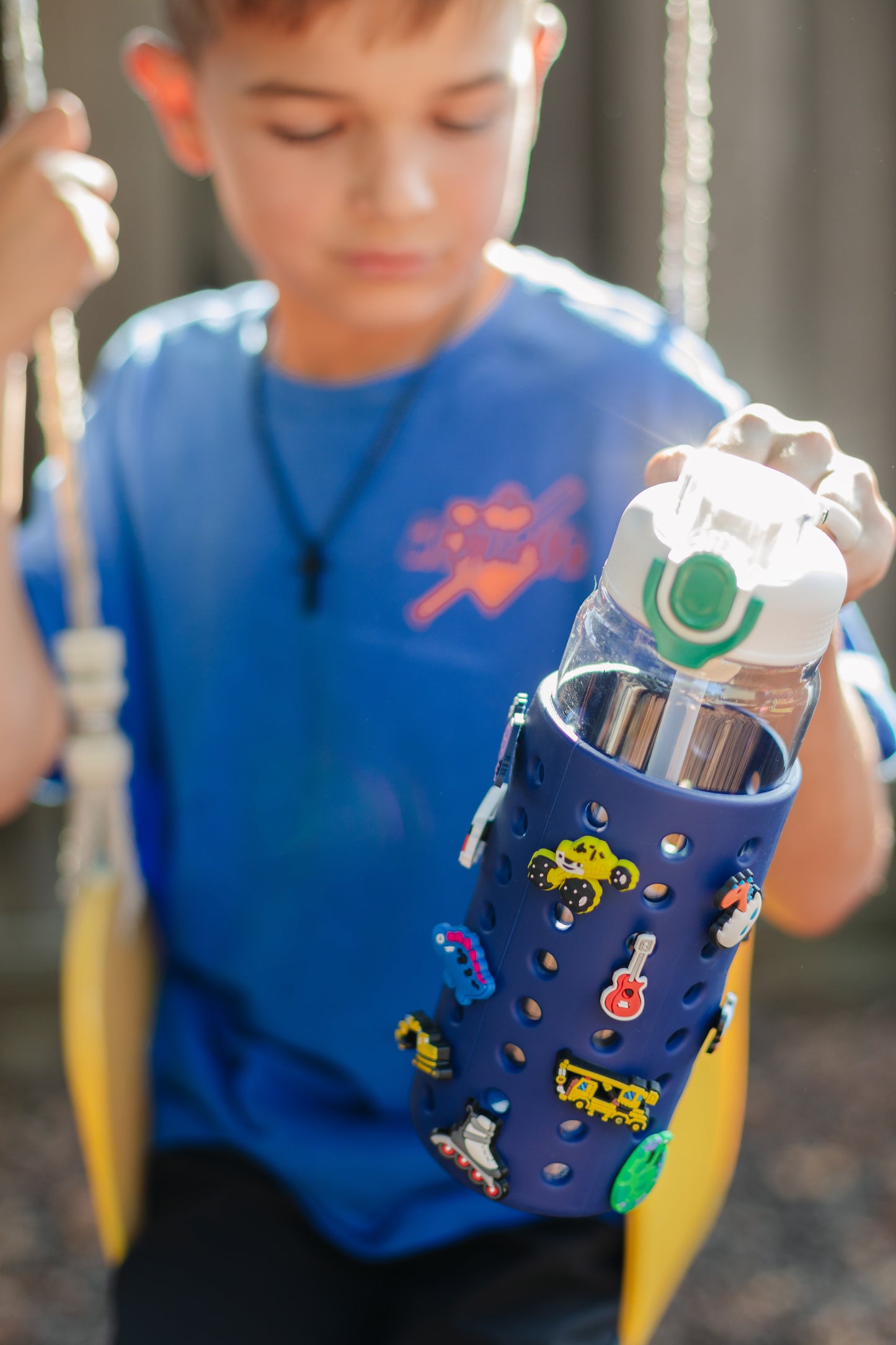 White 24oz Water Bottle with Blue Sleeve