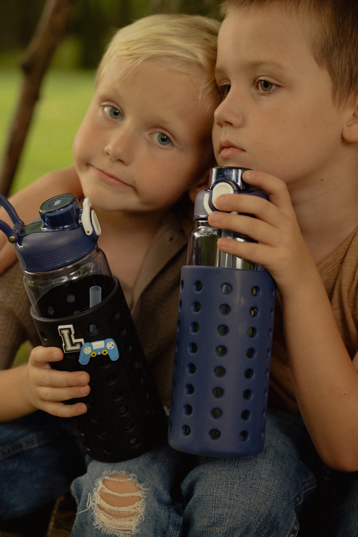 Blue 24oz Water Bottle with black Sleeve