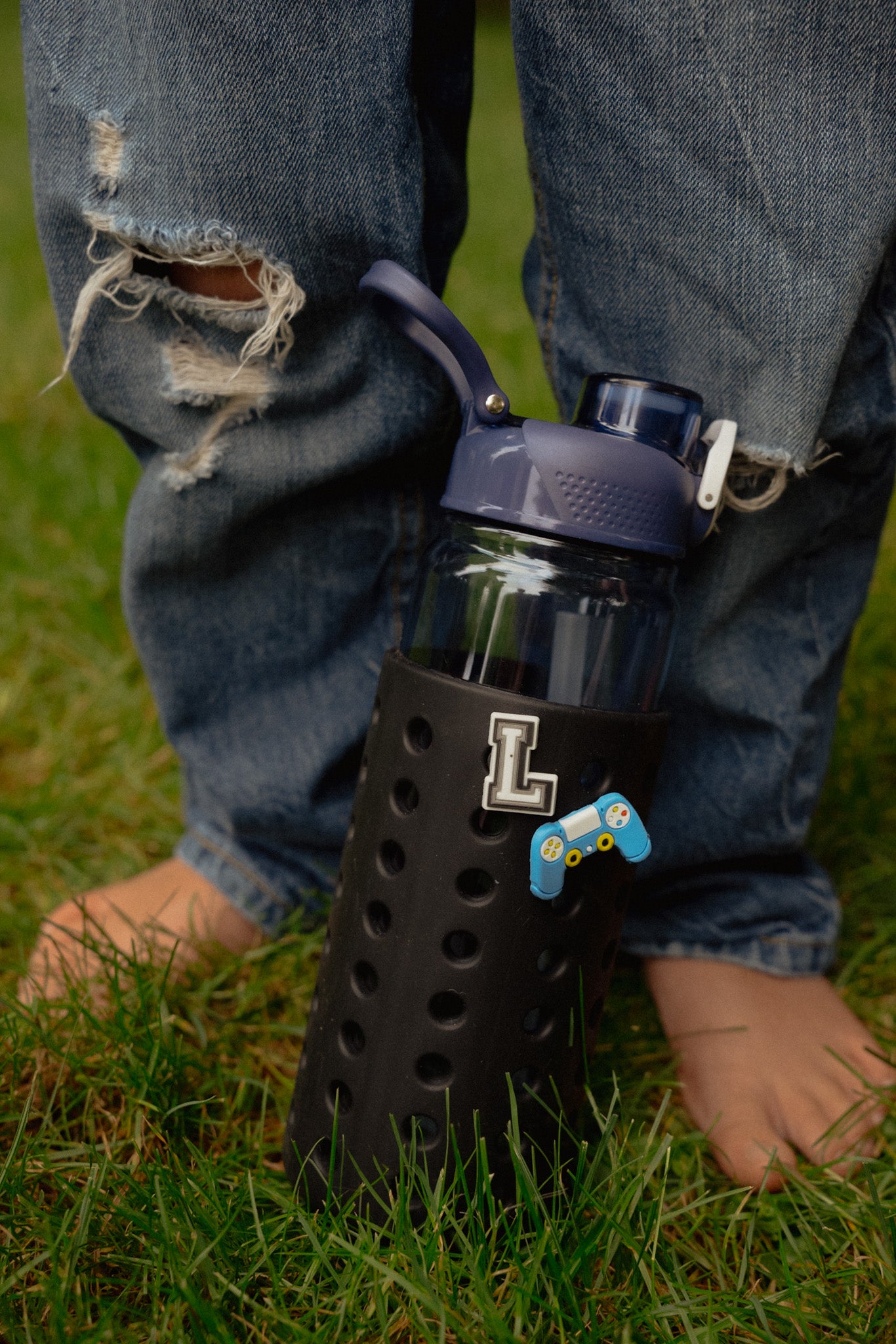 Blue 24oz Water Bottle with black Sleeve